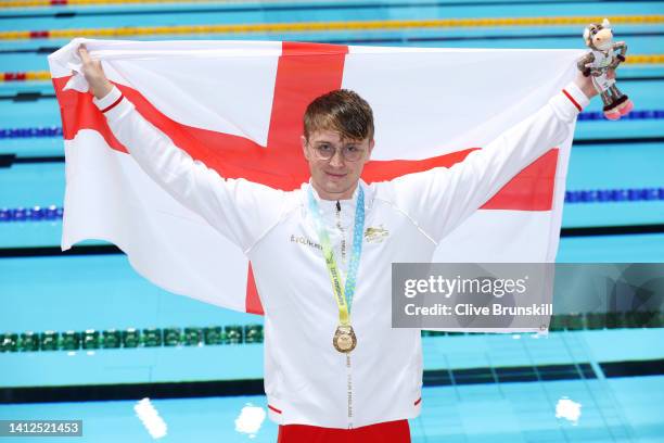 Gold medalist, Brodie Paul Williams of Team England poses with their medal during the medal ceremony for the the Men's 200m Backstroke Final on day...