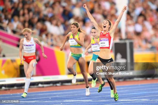 Olivia Breen of Team Wales celebrates after winning the Gold Medal in the Women's T37/38 100m Final on day five of the Birmingham 2022 Commonwealth...