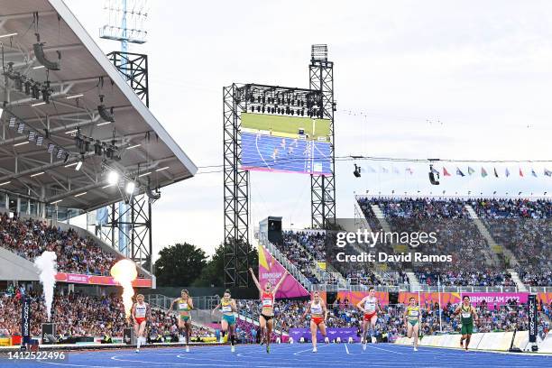 Olivia Breen of Team Wales celebrates after winning the Gold Medal as she crosses the finish line in the Women's T37/38 100m Final on day five of the...