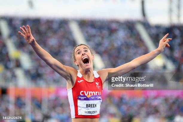 Olivia Breen of Team Wales celebrates after winning the Gold Medal in the Women's T37/38 100m Final on day five of the Birmingham 2022 Commonwealth...