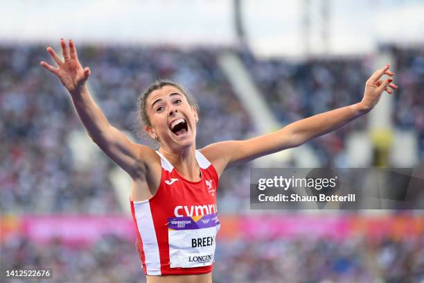 Olivia Breen of Team Wales celebrates after winning the Gold Medal in the Women's T37/38 100m Final on day five of the Birmingham 2022 Commonwealth...