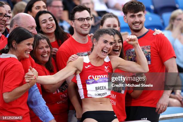 Olivia Breen of Team Wales celebrates with their family after winning the Gold Medal in the Women's T37/38 100m Final on day five of the Birmingham...