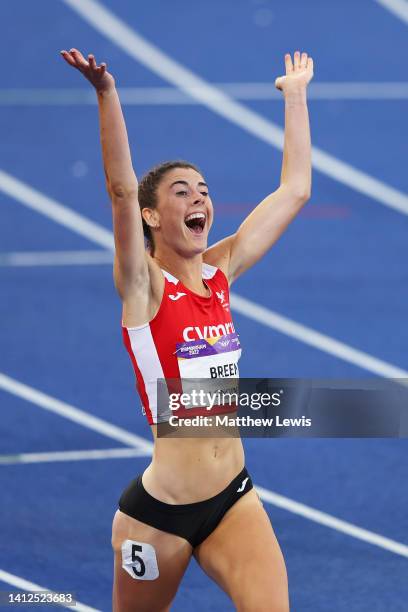 Olivia Breen of Team Wales celebrates after winning the Gold Medal as she crosses the finish line in the Women's T37/38 100m Final on day five of the...