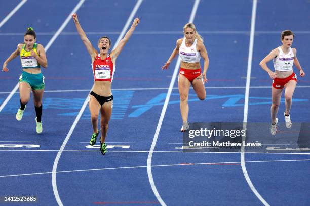 Olivia Breen of Team Wales celebrates after winning the Gold Medal as she crosses the finish line in the Women's T37/38 100m Final on day five of the...