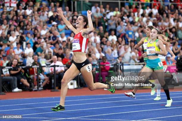 Olivia Breen of Team Wales celebrates after winning the Gold Medal as she crosses the finish line in the Women's T37/38 100m Final on day five of the...