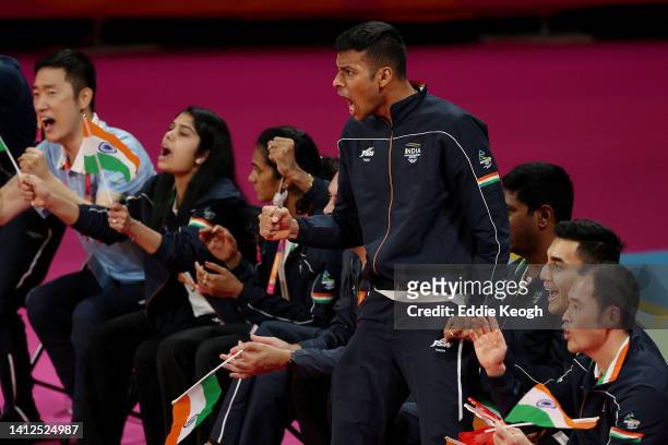 Players and coaches of Team India show their support from the sidelines during Badminton Men's Singles - Gold Medal Match between Malaysia and India...