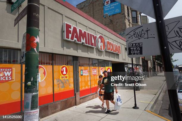 Pedestrians walk past a Family Dollar store in the Humboldt Park neighborhood on August 02, 2022 in Chicago, Illinois. Discount stores have seen a...