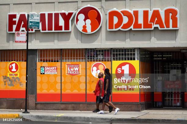 Pedestrians walk past a Family Dollar store in the Humboldt Park neighborhood on August 02, 2022 in Chicago, Illinois. Discount stores have seen a...