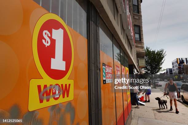 Pedestrians walk past a Family Dollar store in the Humboldt Park neighborhood on August 02, 2022 in Chicago, Illinois. Discount stores have seen a...