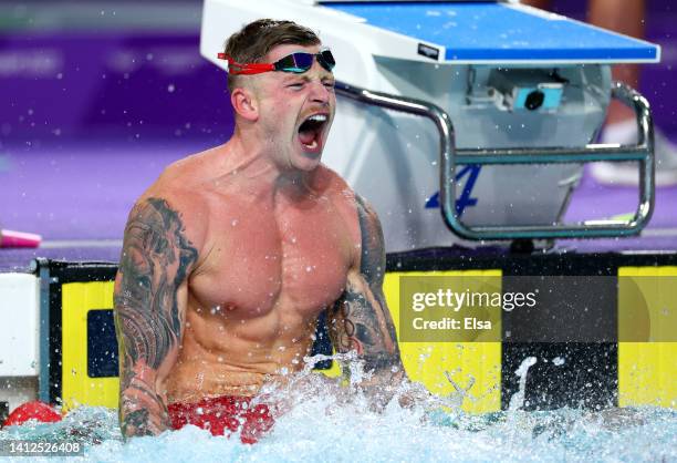 Adam Peaty of Team England celebrates after winning gold in the Men's 50m Breaststroke Final on day five of the Birmingham 2022 Commonwealth Games at...