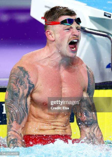 Adam Peaty of Team England celebrates after winning gold in the Men's 50m Breaststroke Final on day five of the Birmingham 2022 Commonwealth Games at...