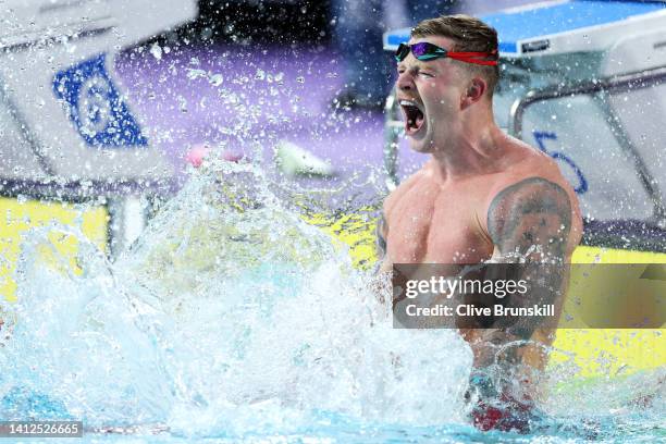 Adam Peaty of Team England celebrates after winning gold in the Men's 50m Breaststroke Final on day five of the Birmingham 2022 Commonwealth Games at...