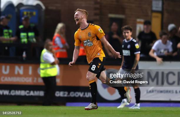 Liam O'Neil of Cambridge United celebrates after scoring the first goal during the Carabao Cup First Round match between Cambridge United and...