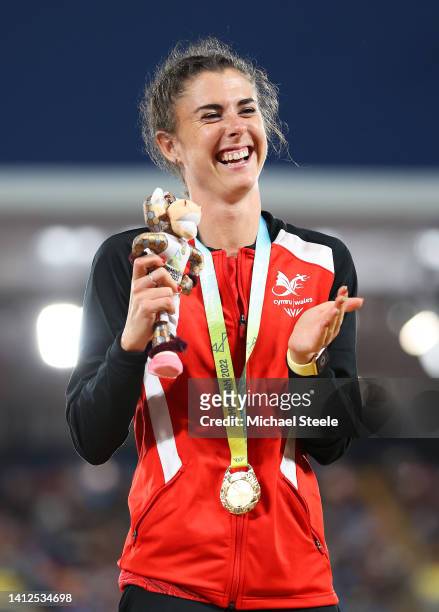 Gold medalist Olivia Breen of Team Wales celebrates during the Women's T37/38 100m medal ceremony on day five of the Birmingham 2022 Commonwealth...