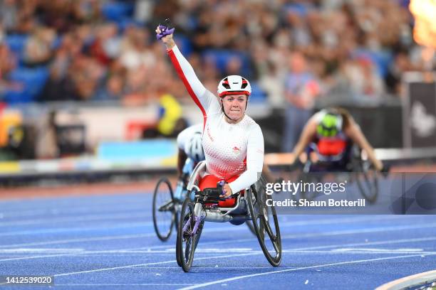 Hannah Cockroft of Team England celebrates winning the Gold medal in the Women's T33/34 100m Final on day five of the Birmingham 2022 Commonwealth...