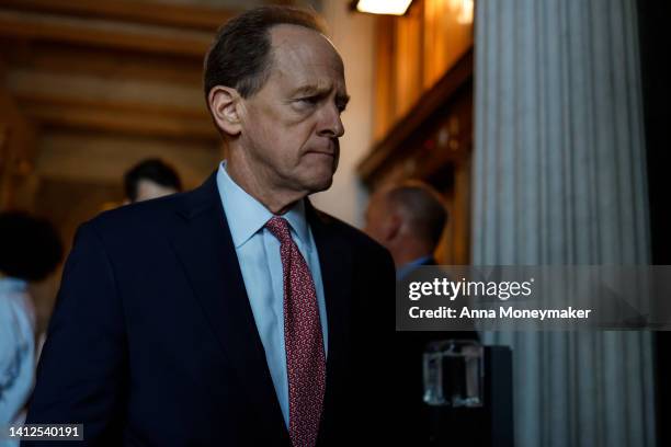 Sen. Pat Toomey walks to the Senate Republican Luncheon in the U.S. Capitol Building on August 02, 2022 in Washington, DC. Negotiations in the U.S....