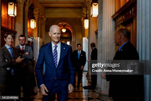 Sen. Rick Scott walks to the Senate Republican Luncheon in the U.S. Capitol Building on August 02, 2022 in Washington, DC. Negotiations in the U.S....