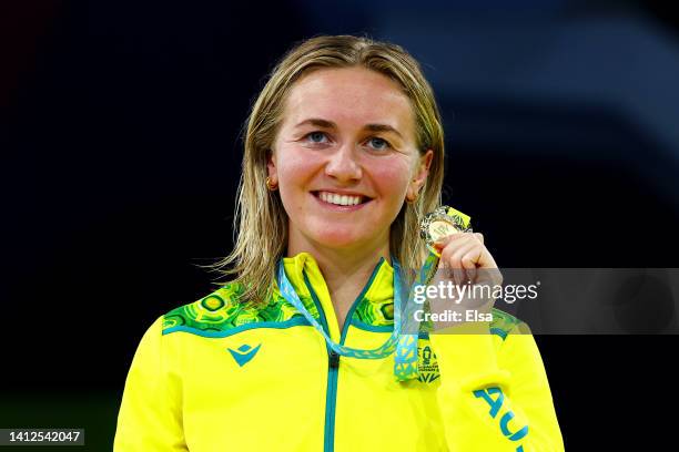 Gold medalist, Ariarne Titmus of Team Australia poses with their medal during the medal ceremony for the competes in the Women's 800m Freestyle Final...