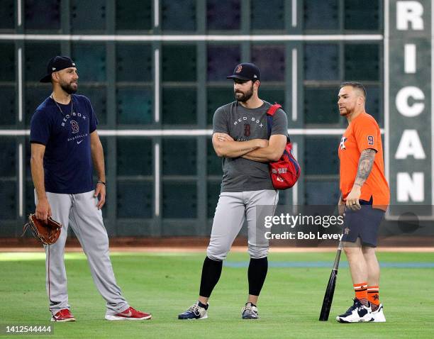 Houston Astros newly acquired catcher Christian Vazquez meets with his former Boston Red Sox teammates before a game at Minute Maid Park on August...