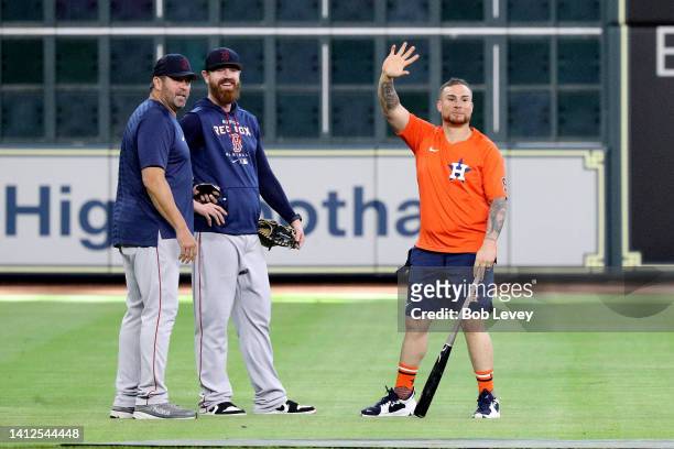 Houston Astros newly acquired catcher Christian Vazquez meets with his former Boston Red Sox teammates before a game at Minute Maid Park on August...