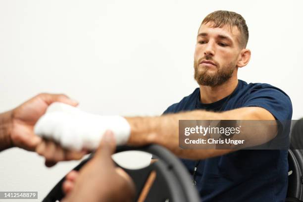 Connor Matthews has his hands wrapped prior to his fight during Dana White's Contender Series season six, week two at UFC APEX on August 02, 2022 in...