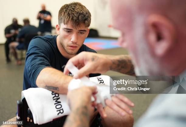 Billy Goff has his hands wrapped prior to his fight during Dana White's Contender Series season six, week two at UFC APEX on August 02, 2022 in Las...