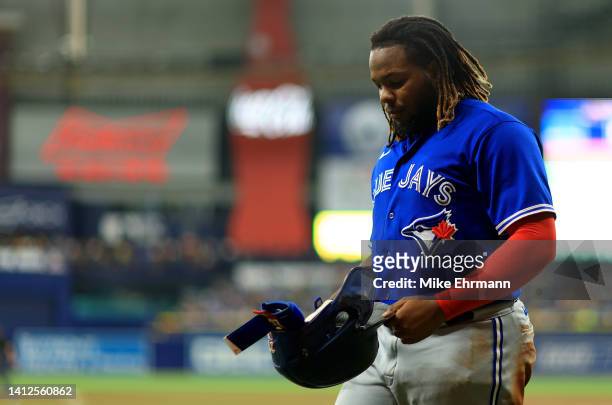 Vladimir Guerrero Jr. #27 of the Toronto Blue Jays looks on during a game against the Tampa Bay Rays at Tropicana Field on August 02, 2022 in St...
