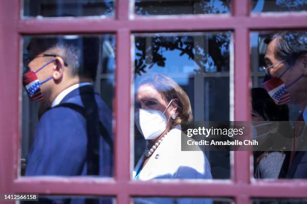 Speaker of the U.S. House Of Representatives Nancy Pelosi , center, arrives at the Legislative Yuan, Taiwan's house of parliament, on August 03, 2022...