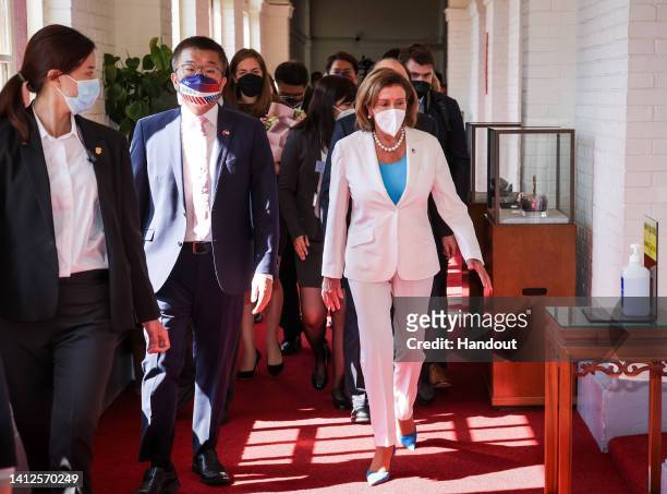 Speaker of the U.S. House Of Representatives Nancy Pelosi , right, arrives at the Legislative Yuan, Taiwan's house of parliament, on August 03, 2022...