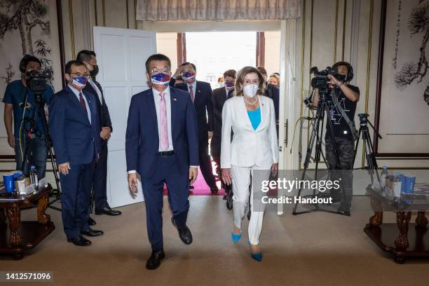 Speaker of the U.S. House Of Representatives Nancy Pelosi , front right, arrives at the Legislative Yuan, Taiwan's house of parliament, with Tsai...