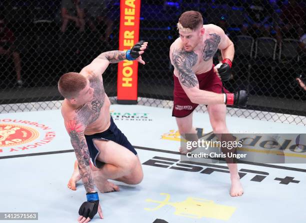 Charlie Campbell punches Chris Duncan of Scotland in a lightweight fight during Dana White's Contender Series season six, week two at UFC APEX on...