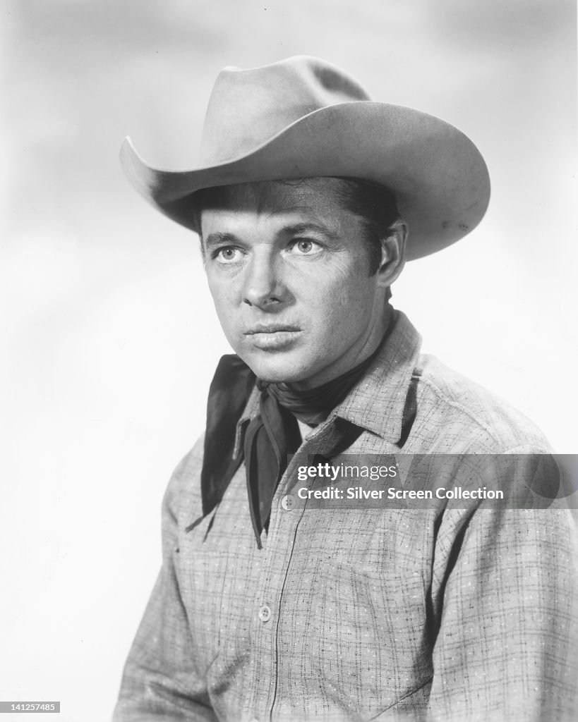 Audie Audie Murphy , US actor, wearing a cowboy hat, Western shirt and ...