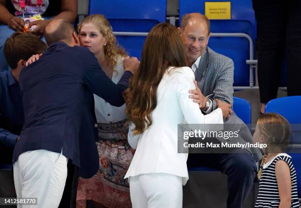 Princess Charlotte of Cambridge looks on as Prince William, Duke of Cambridge and Catherine, Duchess of Cambridge greet Lady Louise Windsor and...