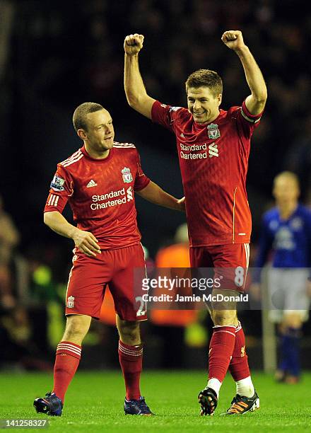 Jay Spearing and Steven Gerrard of Liverpool celebrate victory in the Barclays Premier League match between Liverpool and Everton at Anfield on March...