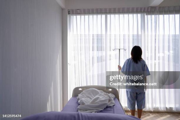 patient with illness in hospital room and worry. - medical encouragement stock pictures, royalty-free photos & images