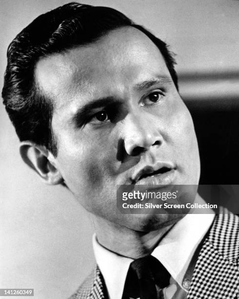 Headshot of Henry Silva, US actor, in a publicity portrait issued for the film, 'Johnny Cool', USA, 1963. The crime drama, directed by William Asher,...