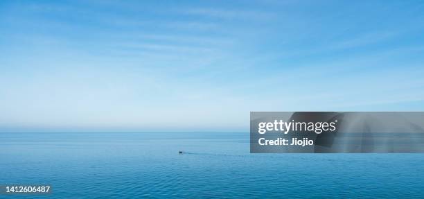 seascape in the morning - small boat ocean fotografías e imágenes de stock