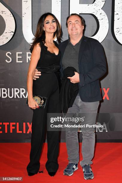 Italian actress Maria Grazia Cucinotta and her husband Giulio Violati during the premiere of Suburra - The Series at The Space Cinema Moderno. Rome ,...