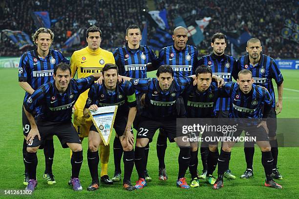 Inter Milan's players pose before the Champions League match between Inter and Marseille, on March 13, 2011 in San Siro stadium in Milan . AFP PHOTO...