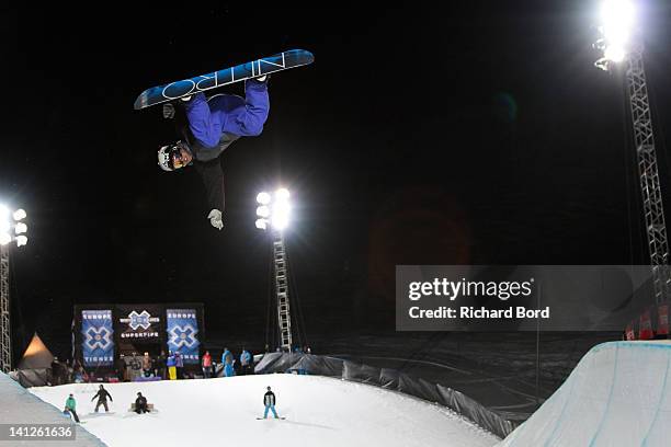 Rider rides the Superpipe during the Winter X-Games Europe second training day on March 13, 2012 in Tignes, France.