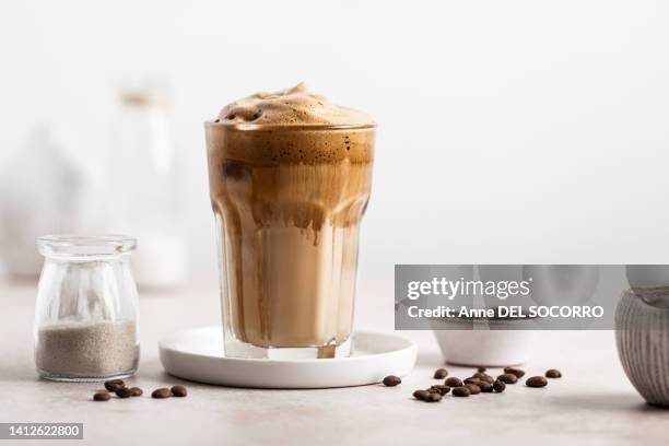 dalgona iced coffee with vegetal milk - iced coffee cup stock pictures, royalty-free photos & images