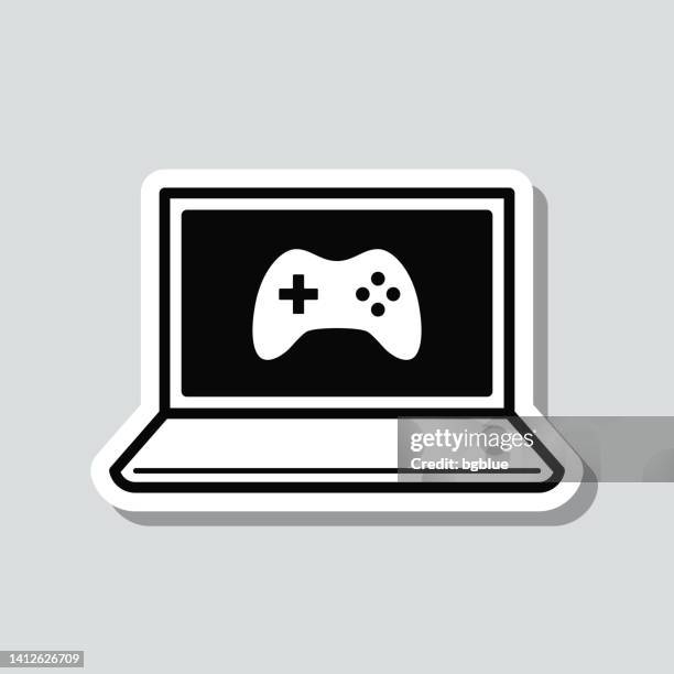 video game on laptop. icon sticker on gray background - gaming controller white stock illustrations
