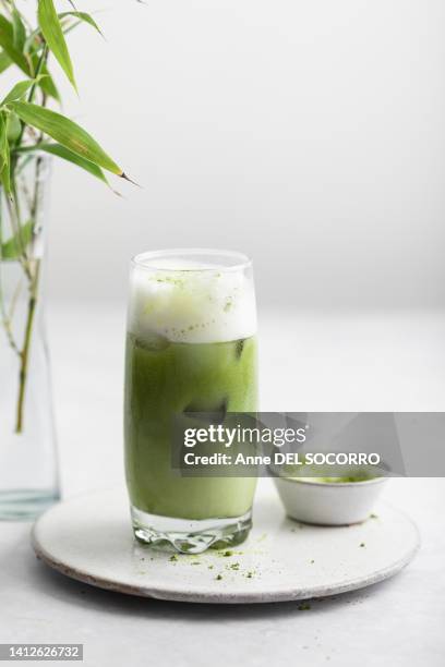 fresh matcha latte iced tea drink - ice tea stock pictures, royalty-free photos & images