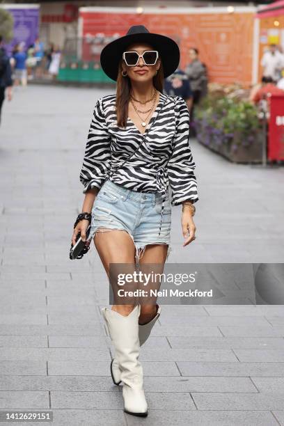 Myleene Klass leaves Smooth Radio Studios on August 03, 2022 in London, England.