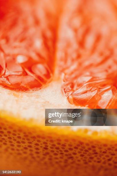 ruby grapefruit close up macro fruit - fruit flesh stock pictures, royalty-free photos & images