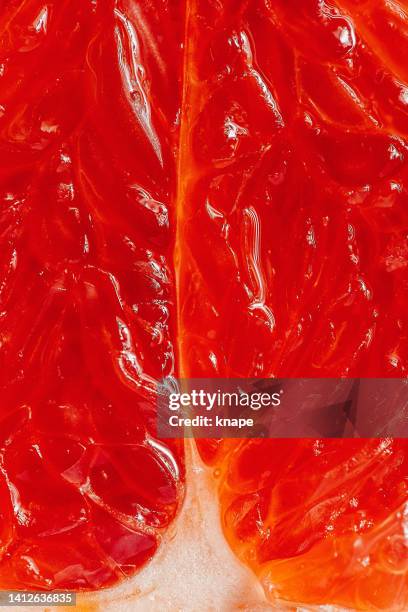 ruby grapefruit close up macro fruit - fruktkött bildbanksfoton och bilder