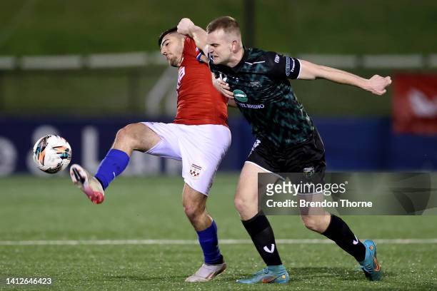 Andrea Agamemnonos of Sydney United 58 FC competes with mon16during the Australia Cup Rd of 32 match between Sydney United 58 FC and Monaro Panthers...