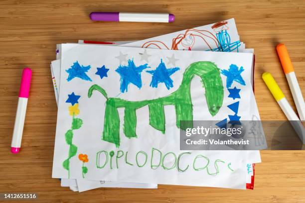 dinosaur animal child drawing - dinosaur drawing stock pictures, royalty-free photos & images