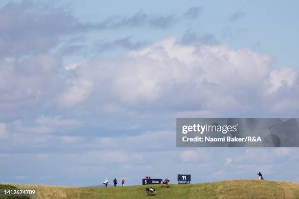 Players walk up the 11th hole during the Pro-Am prior to the AIG Women's Open at Muirfield on August 03, 2022 in Gullane, Scotland.