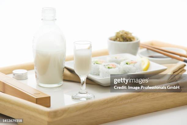 sake and sushi - sake stock pictures, royalty-free photos & images